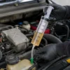 300 ml ruisku letkulla öljyn täyttämiseen ja nesteiden siirtoon autossa